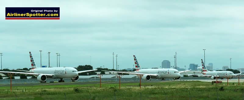 American Airlines Boeing 777, 787 and 737 airliners awaiting takeoff at the DFW International Airport